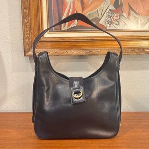 Hermes Tsako in black ardennes leather with gold tone hardware